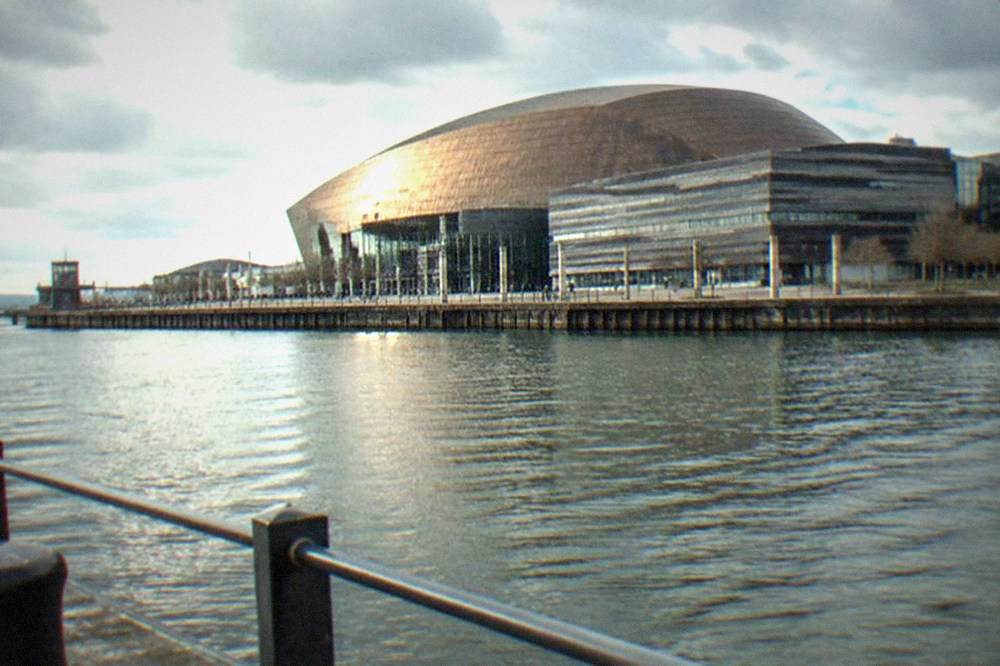 The waterfront at Cardiff Bay with the Wales Millennium Centre building across the water