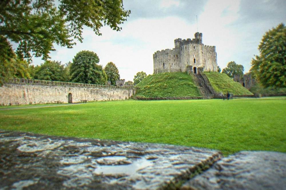 The Norman keep of Cardiff Castle seen from inside the castle green
