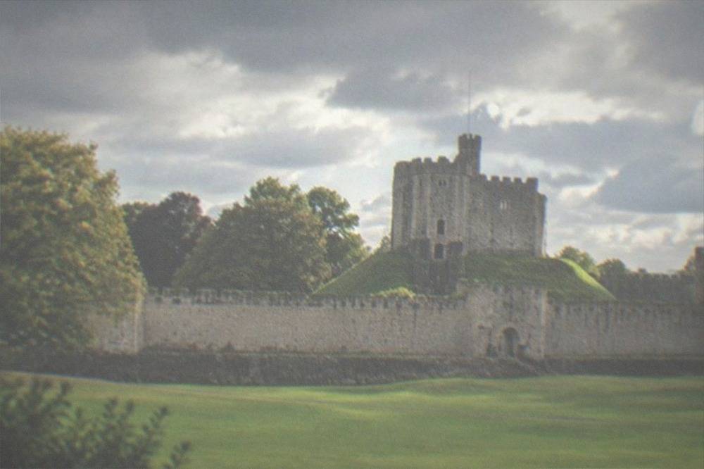 The Norman keep of Cardiff Castle seen from the outer green lawns