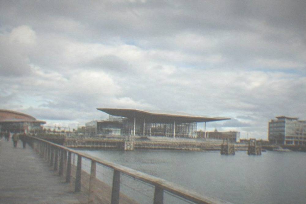 The Cardiff Bay waterfront walkway leading towards the Senedd