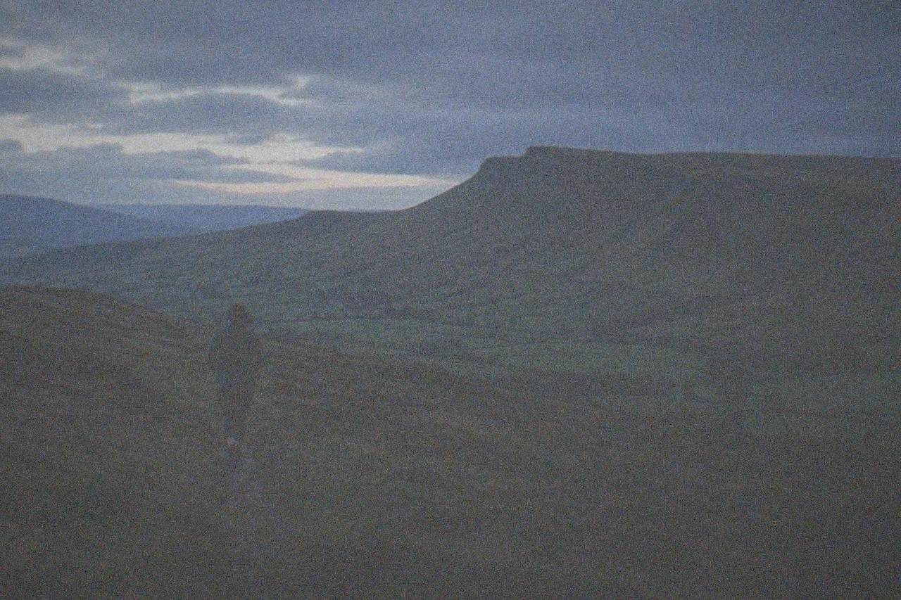 Rolling moorland hills under a wide sky in the Brecon Beacons national park