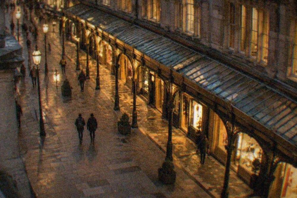 Illuminated Victorian arcades and city-centre streets in Cardiff at night