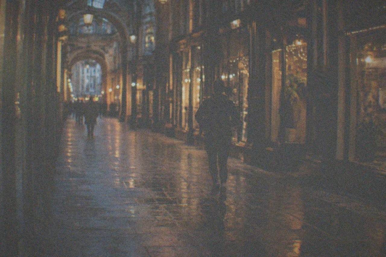 Illuminated Victorian arcades and city-centre streets in Cardiff at night