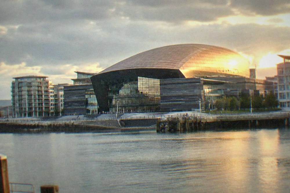Wide view across Cardiff Bay with the Wales Millennium Centre and waterfront buildings