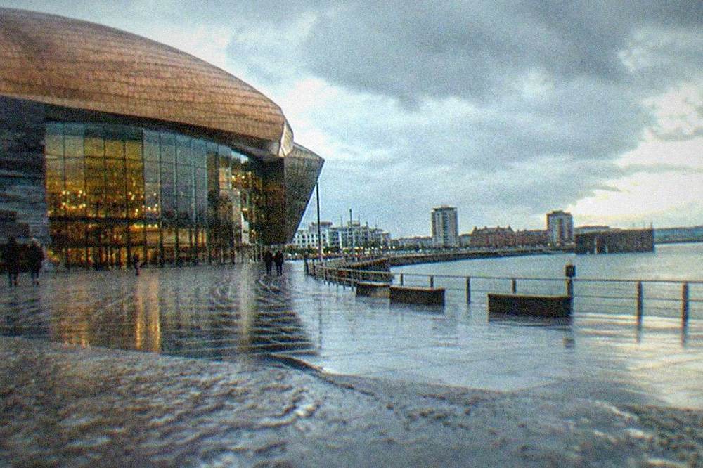 Cardiff Bay waterfront with the Wales Millennium Centre at dusk