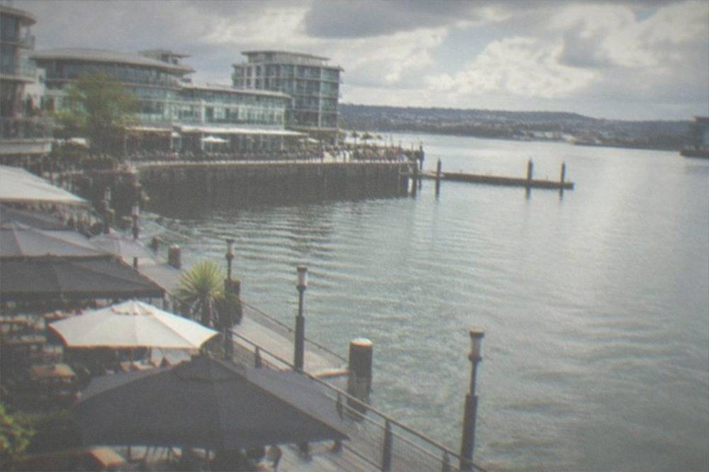 Mermaid Quay's modern bars and restaurants facing the water in Cardiff Bay