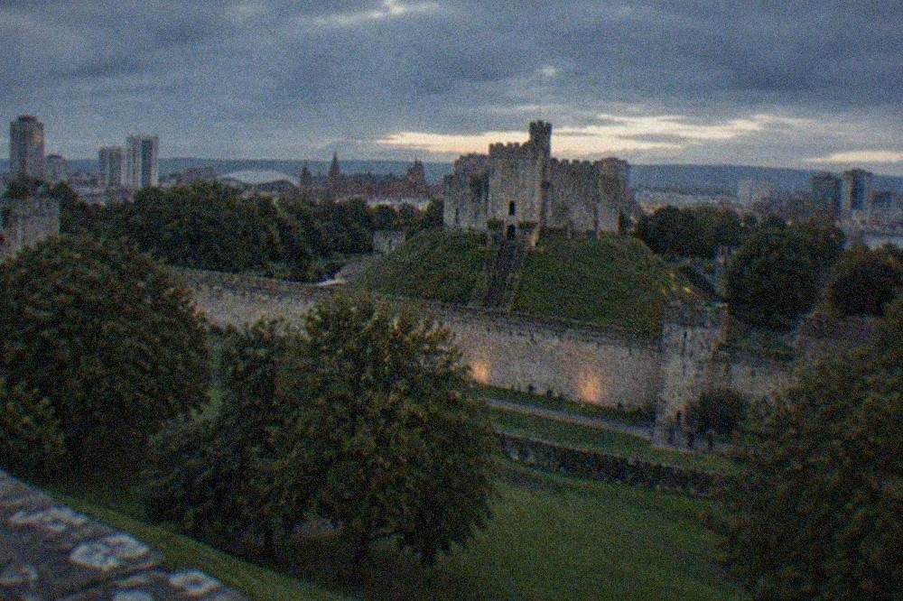 Cardiff Castle keep rising above green lawns in the city centre