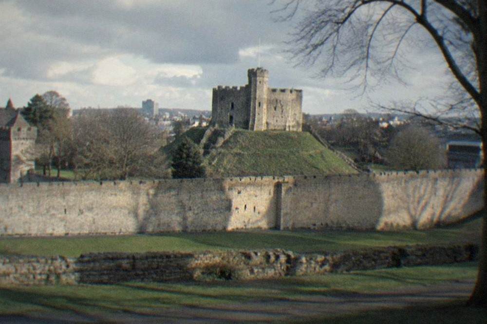 Cardiff Castle keep with parkland and city rooftops beyond
