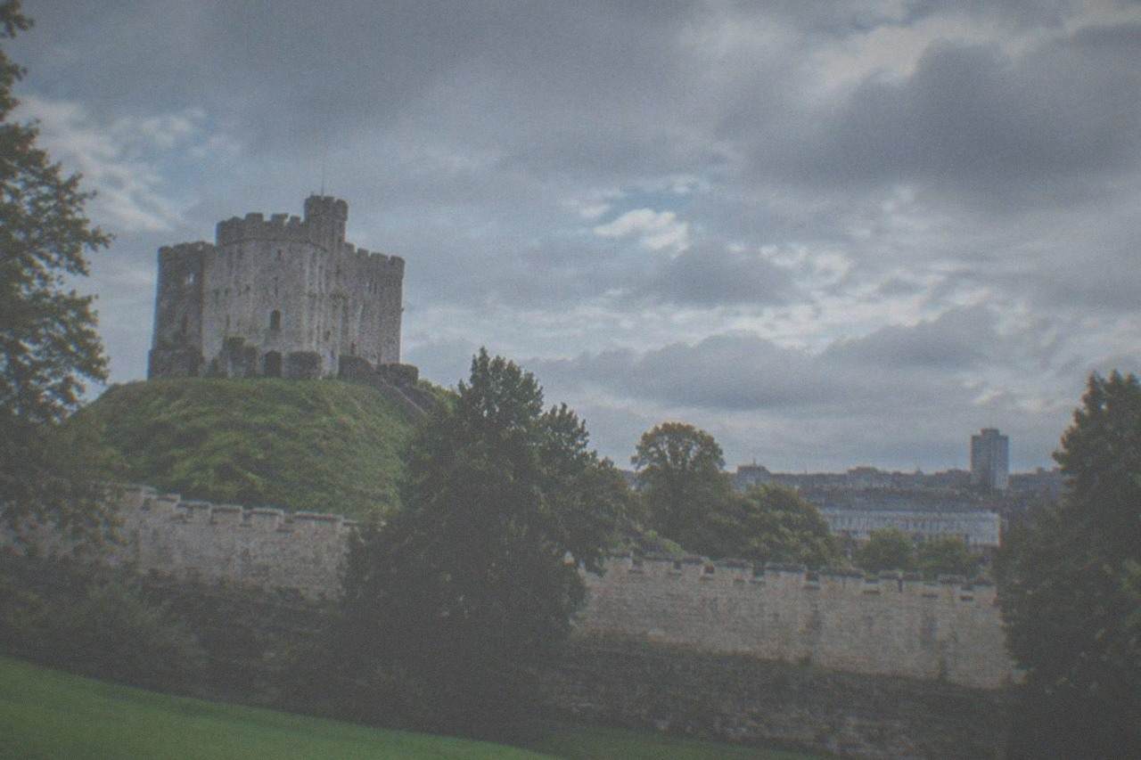 Cardiff Castle keep with parkland and city rooftops beyond